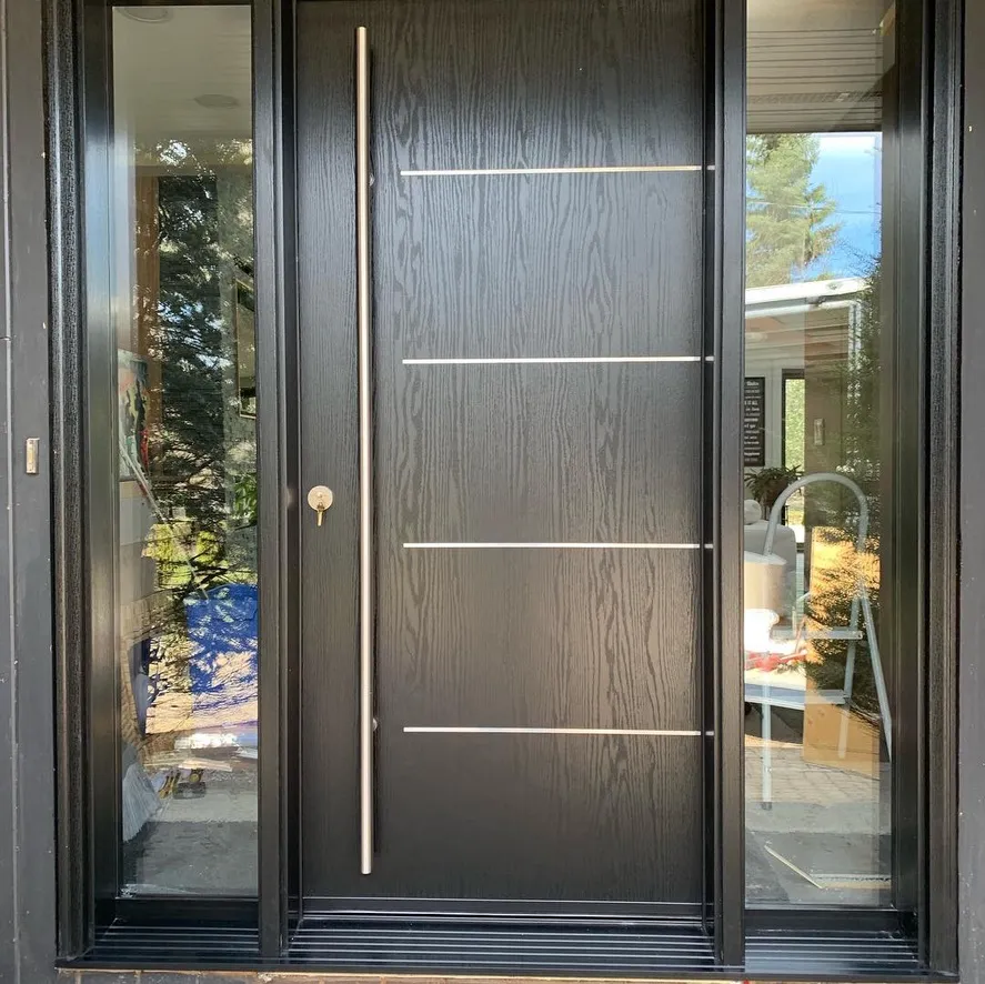 Black double entry doors with full-height sidelights