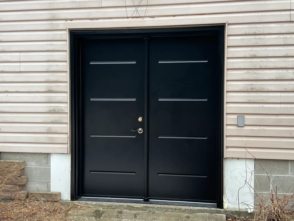 Black double entry door with horizontal metal details