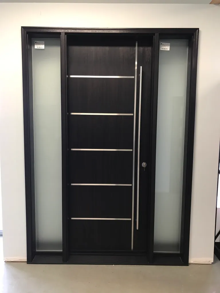 Black wood-look entry door with frosted sidelights and horizontal metal details