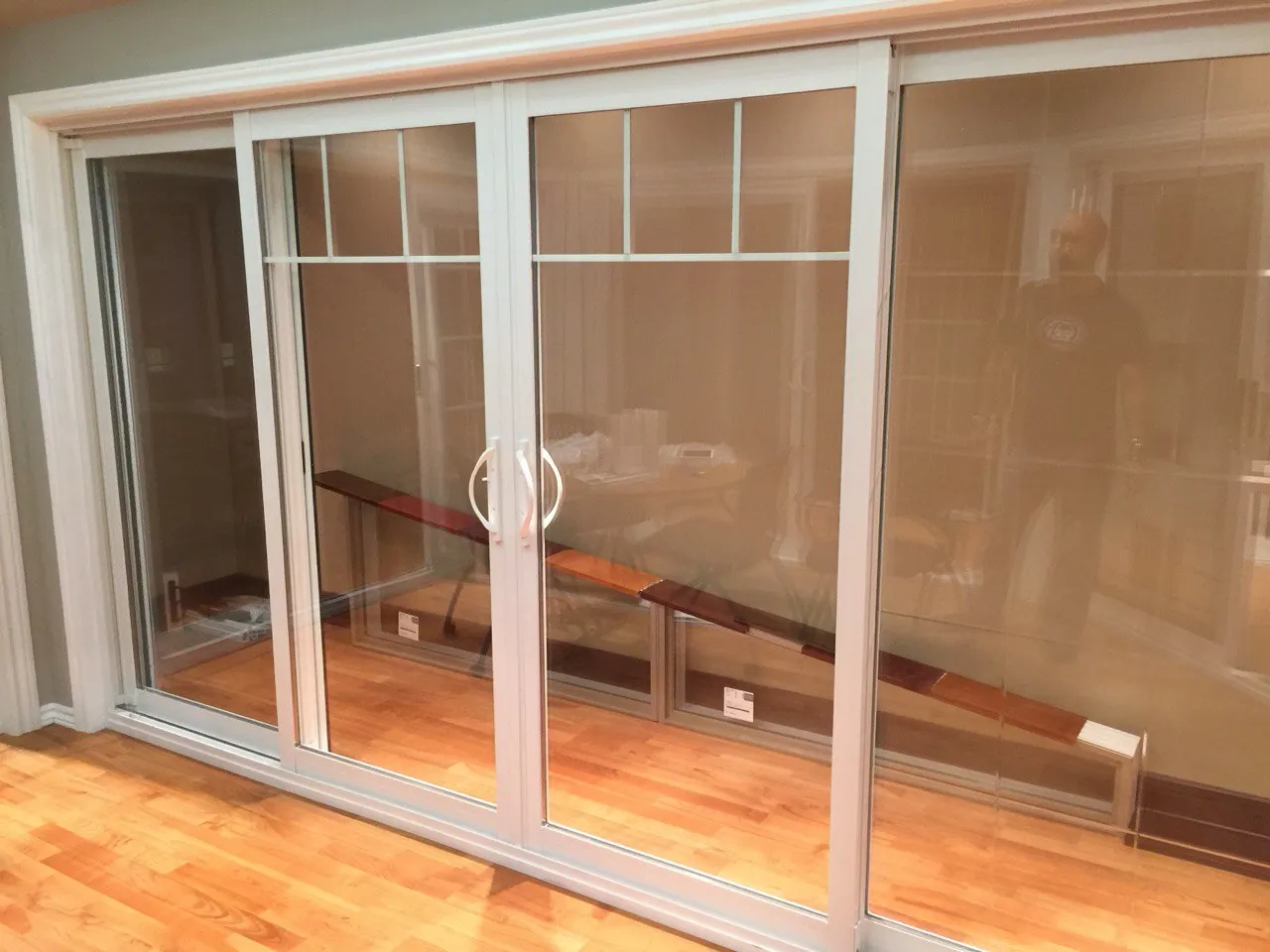Interior view of a white-framed patio sliding door