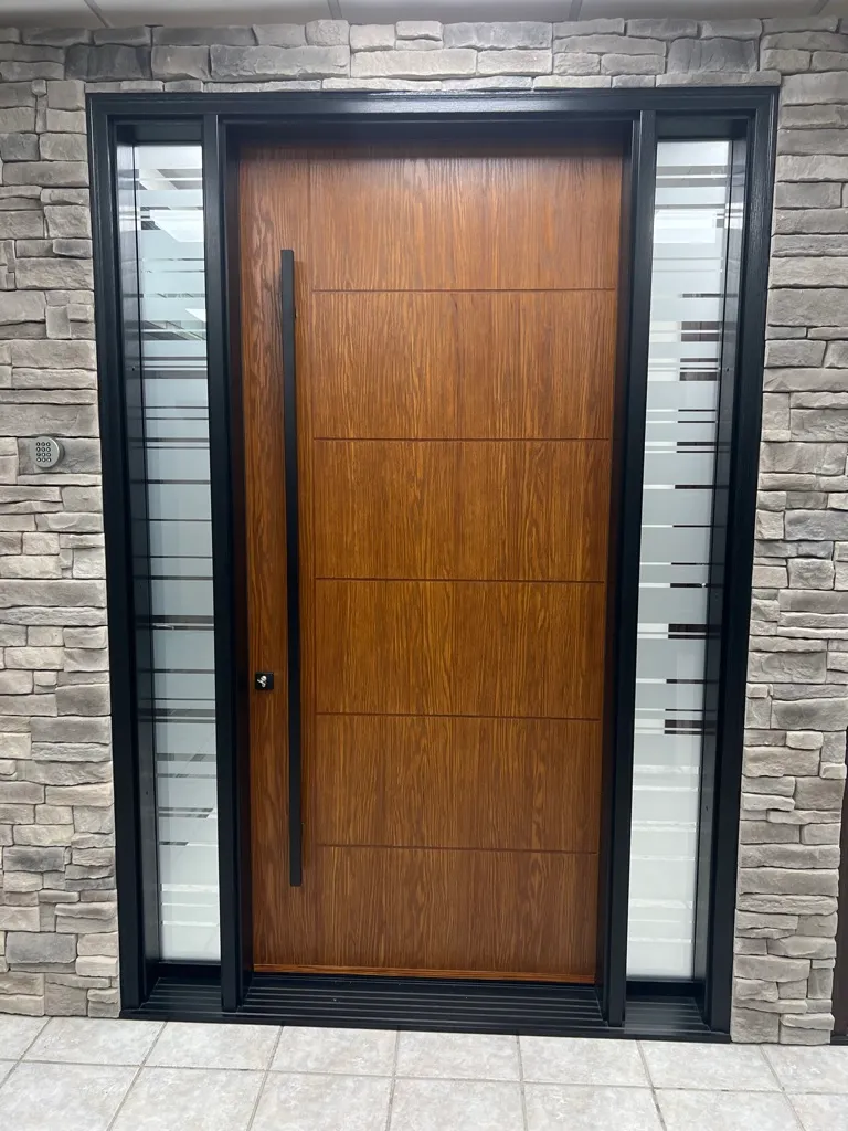 Warm wood-look entry door in a dark frame