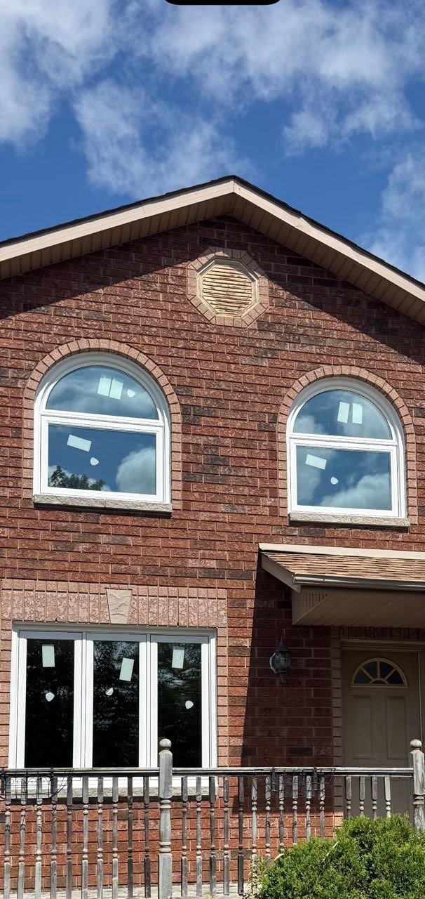 Brick Barrie home after replacement windows were installed