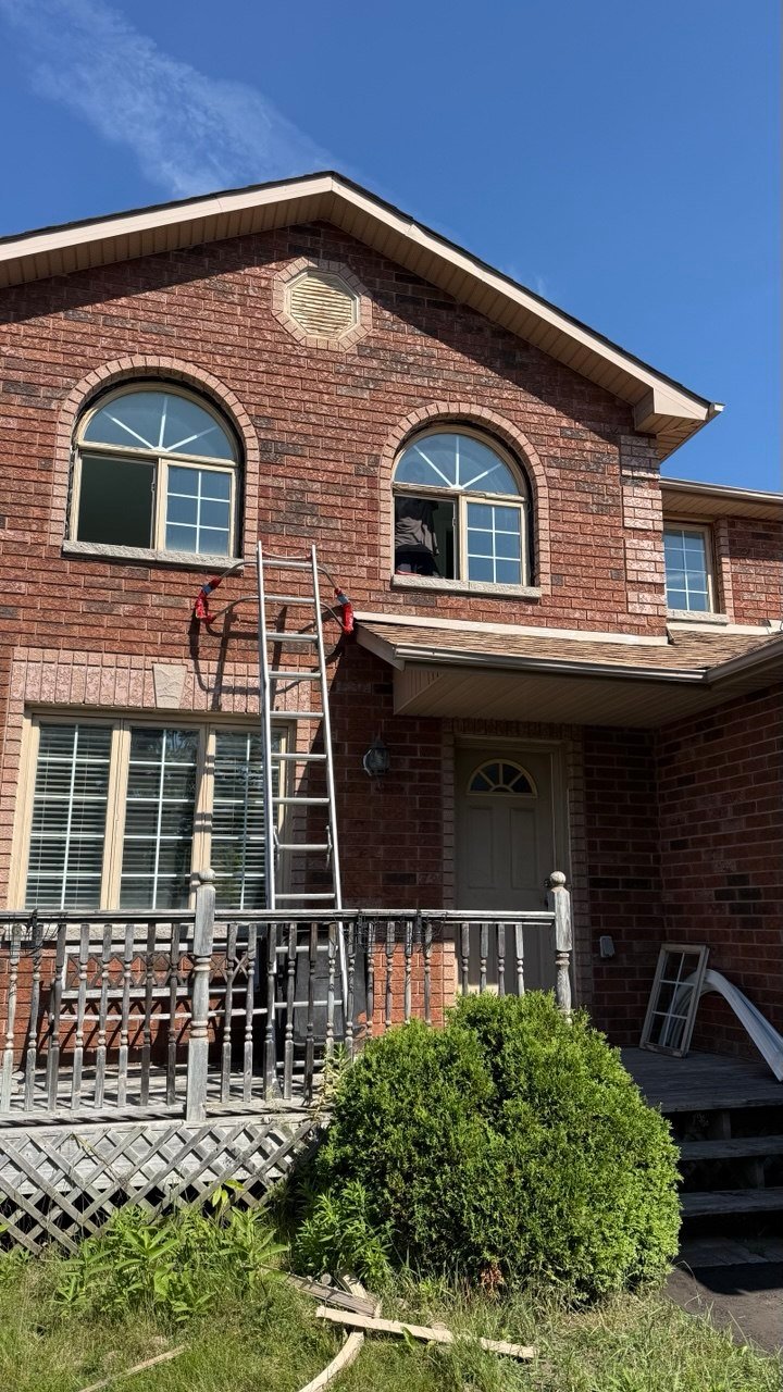 Brick Barrie home before front window replacement